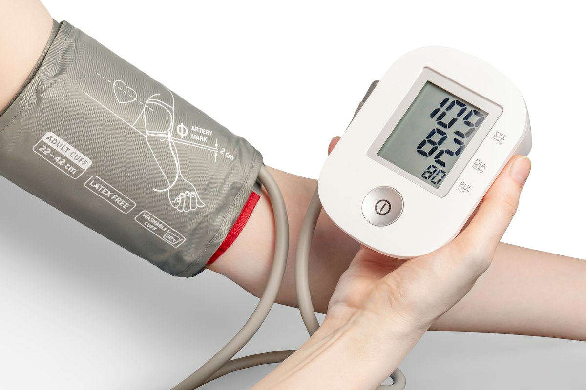 Digital blood pressure monitor with an upper-arm cuff